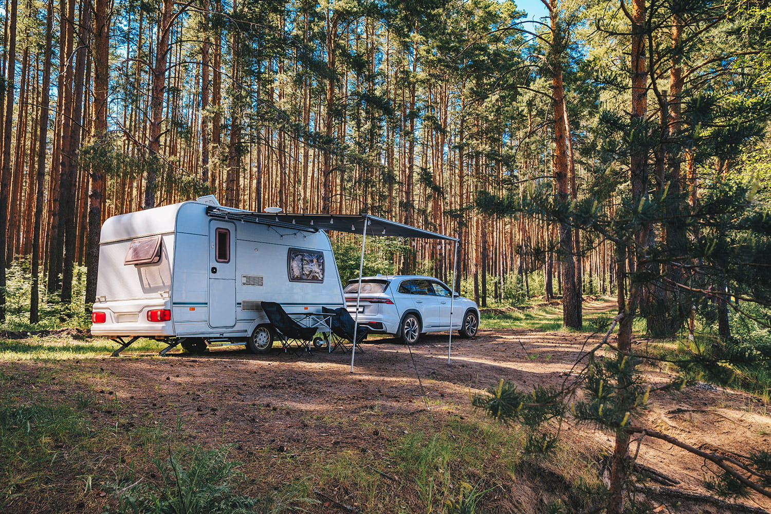 An image of a caravan on a camp site.